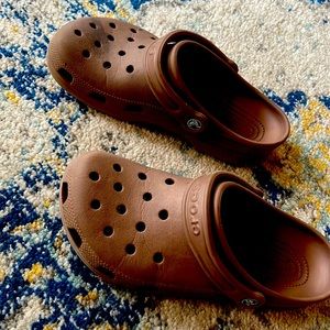 Worn crocs with small stain